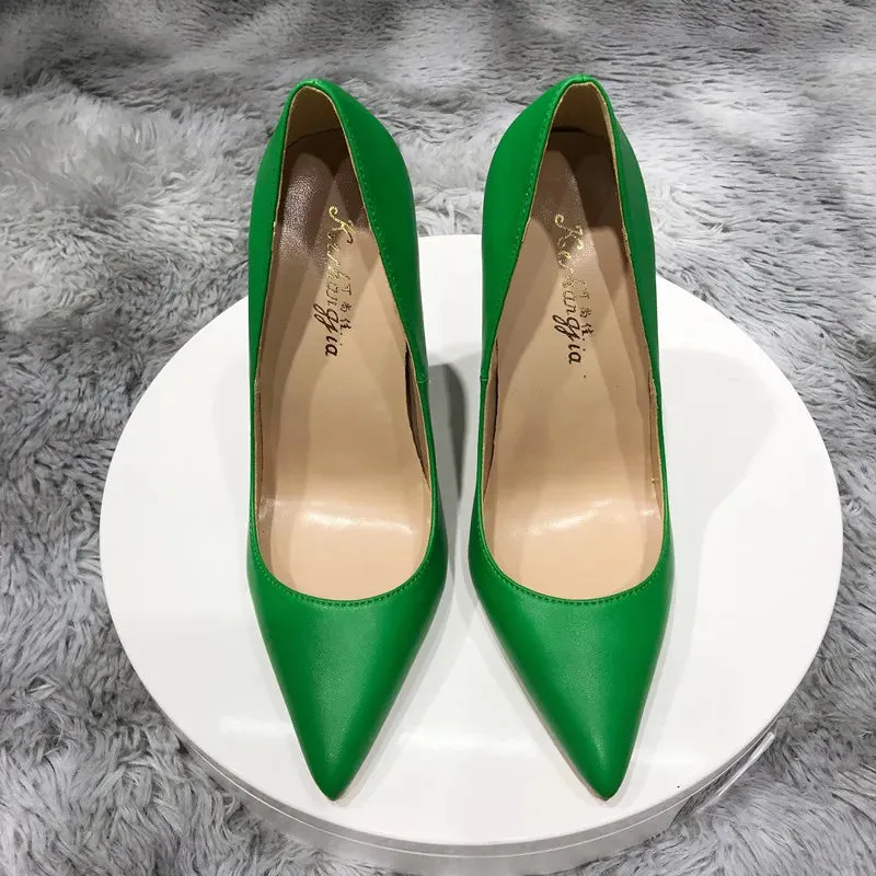 Green solid pointed women high heels