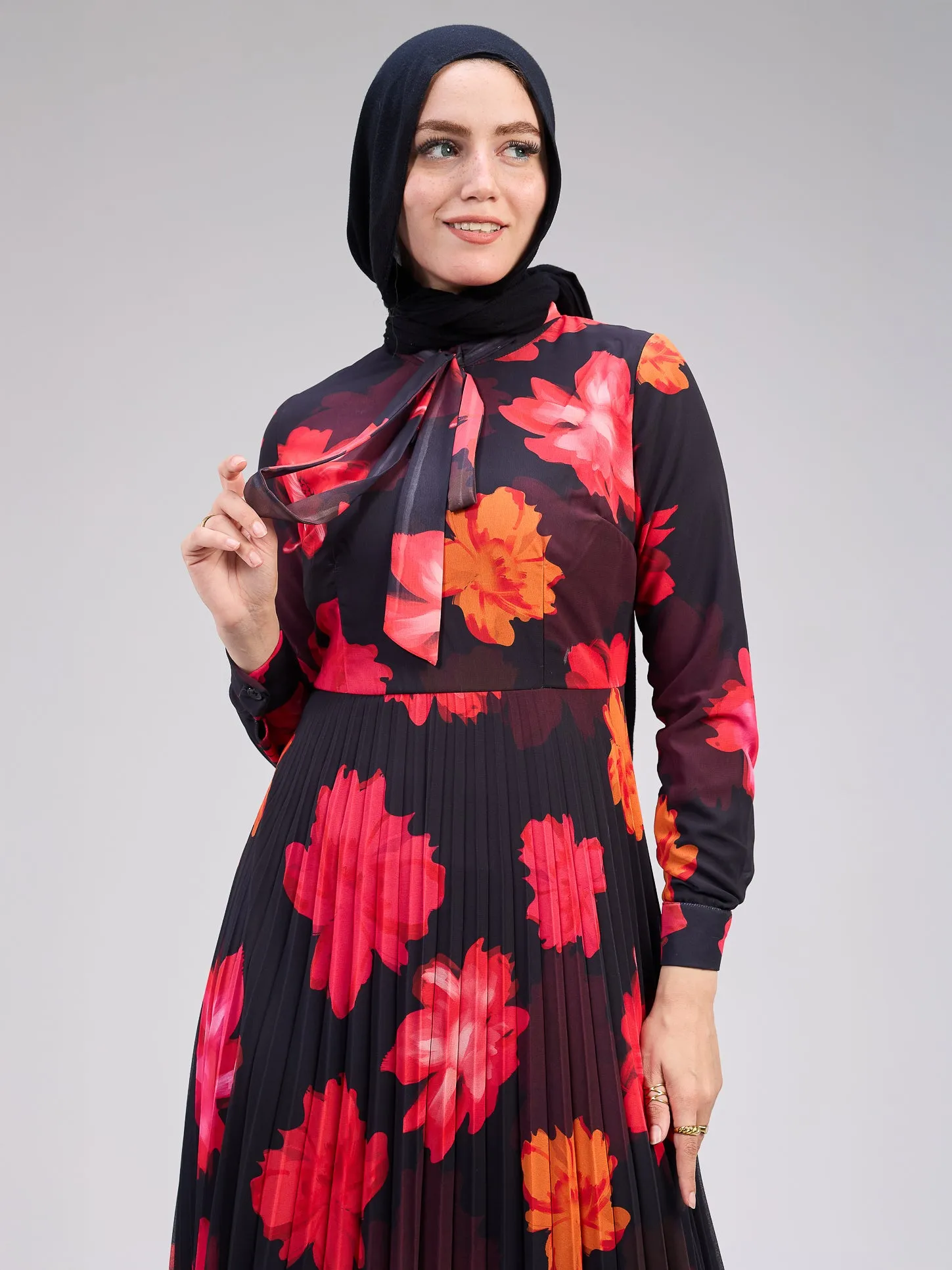 Nismah Chiffon Maxi Dress in Vibrant Floral Print with Pleats